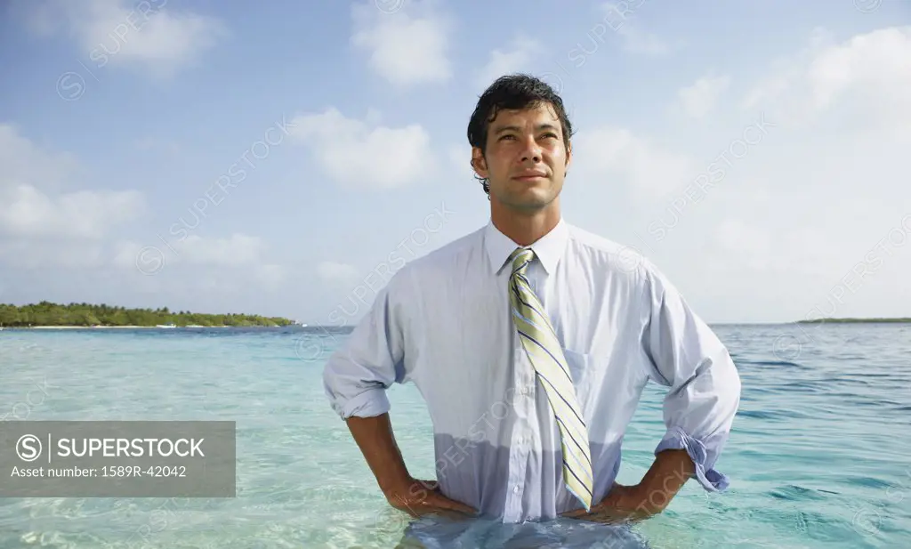South American businessman in water