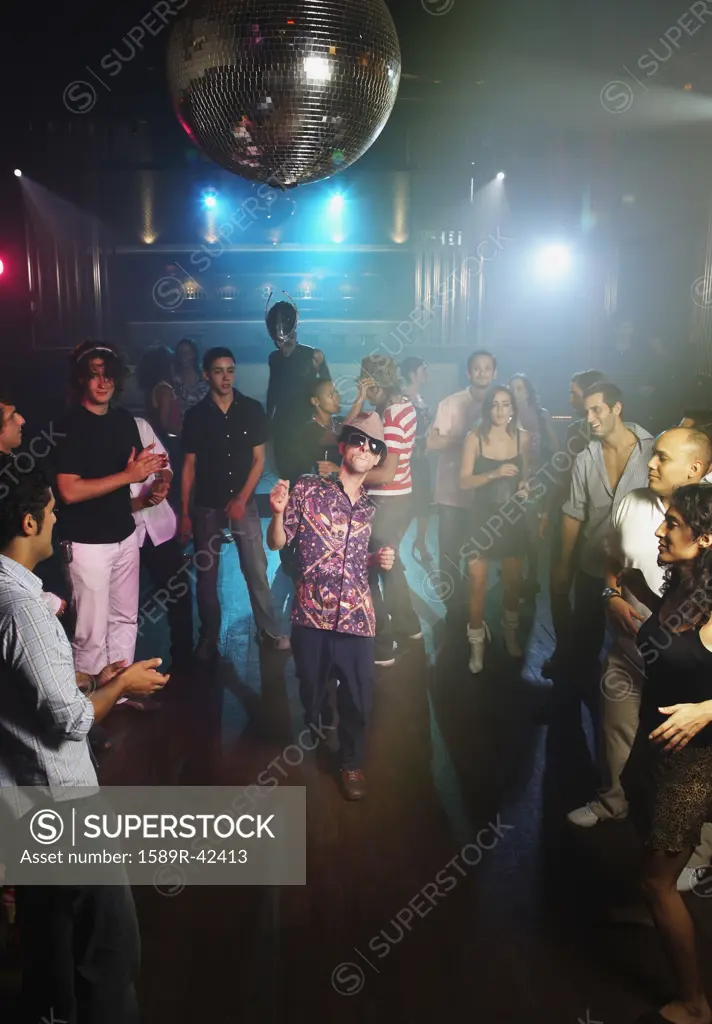 Hispanic man dancing at nightclub