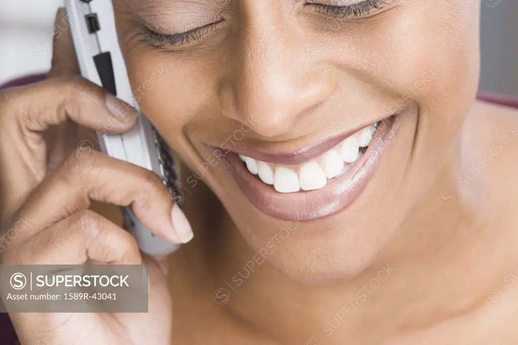 African American woman talking on cell phone