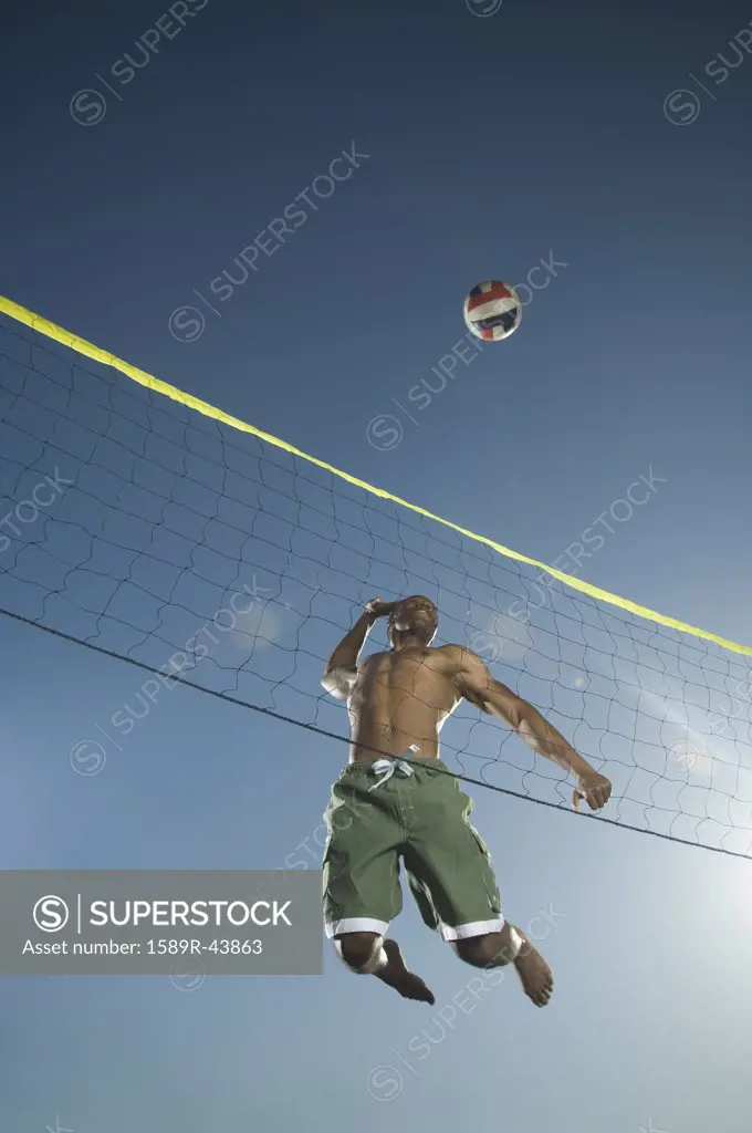 African American man playing volleyball
