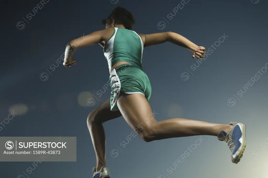 African American female athlete running