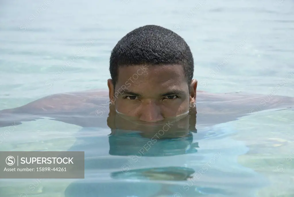 Hispanic man in water