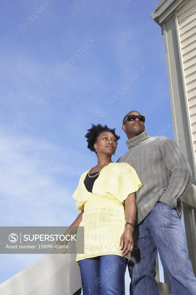 African couple under blue sky