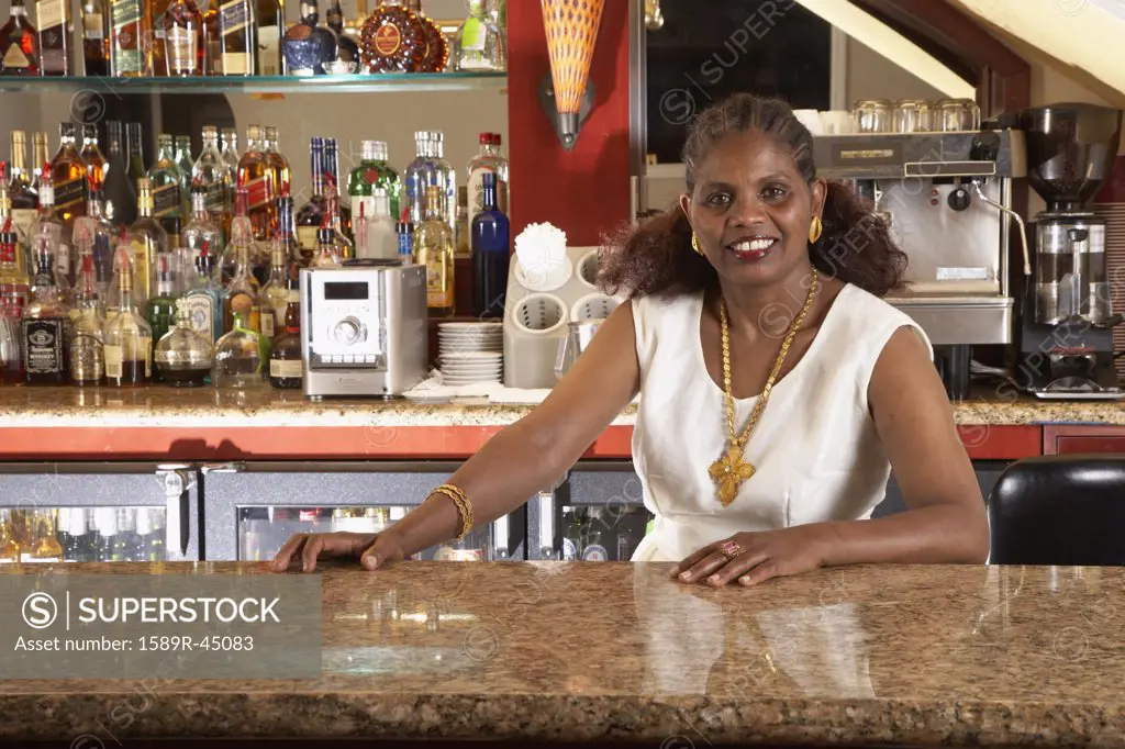 Portrait of African female bartender
