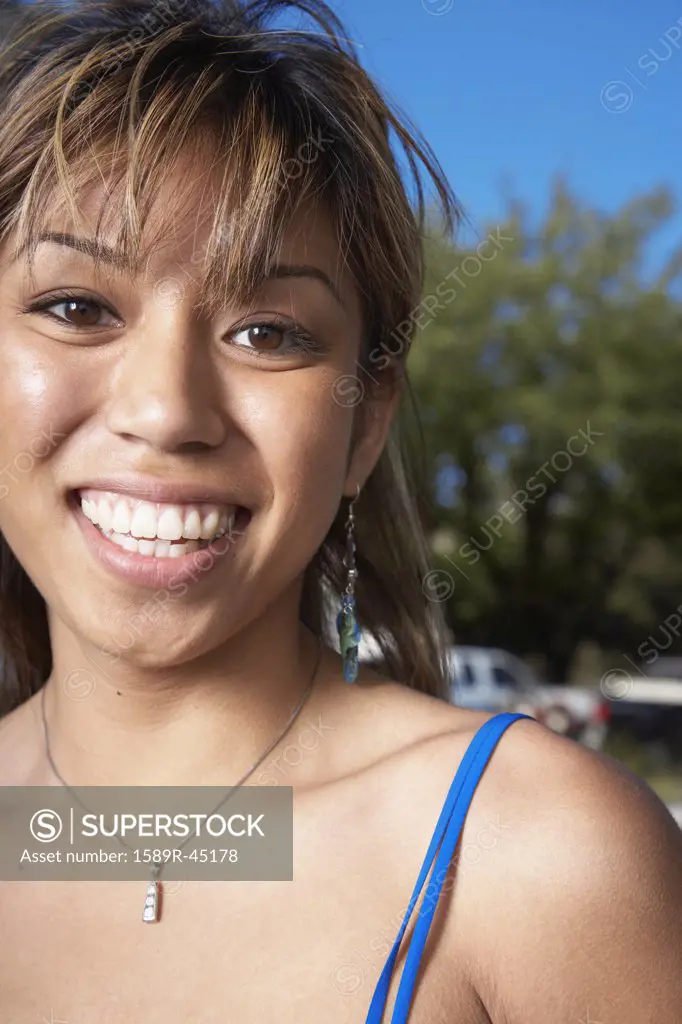 Close up of Asian woman smiling
