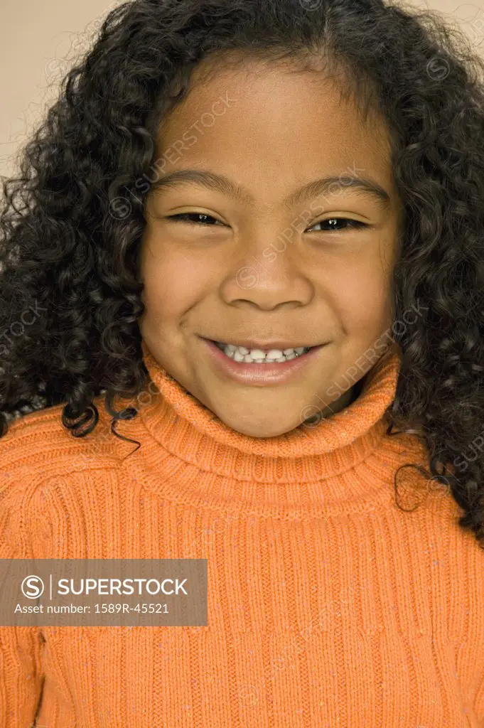 Pacific Islander girl with curly hair