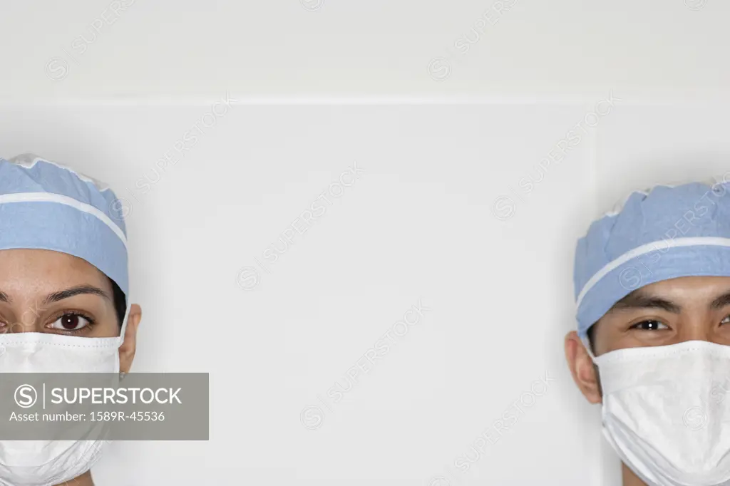 Asian medical professionals wearing surgical masks