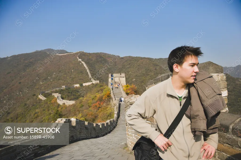 Asian man on Great Wall of China