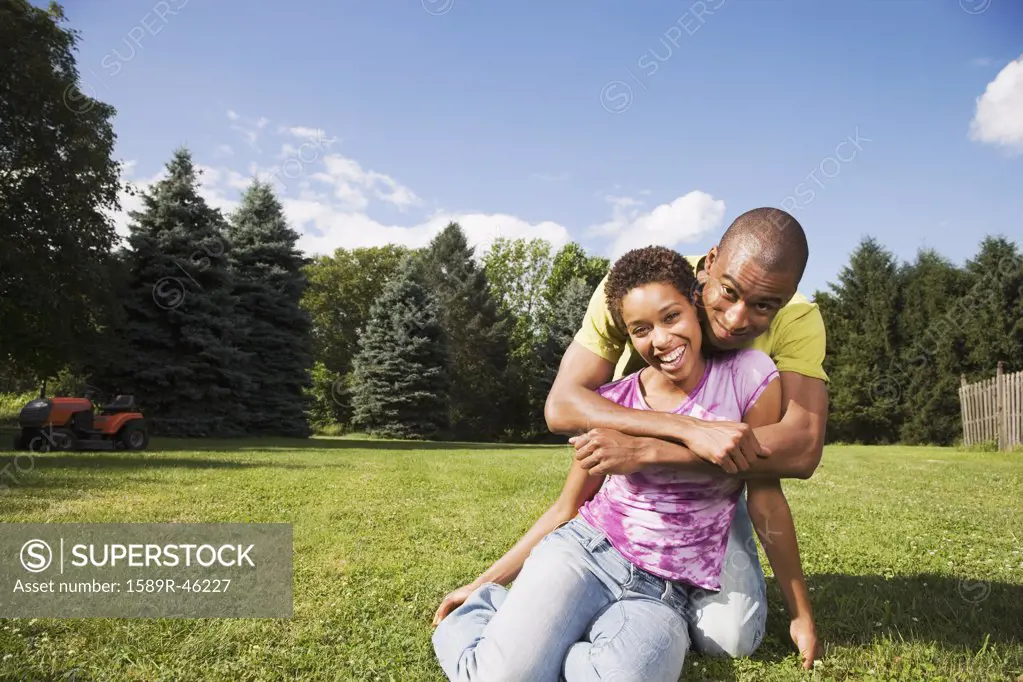 African American couple hugging