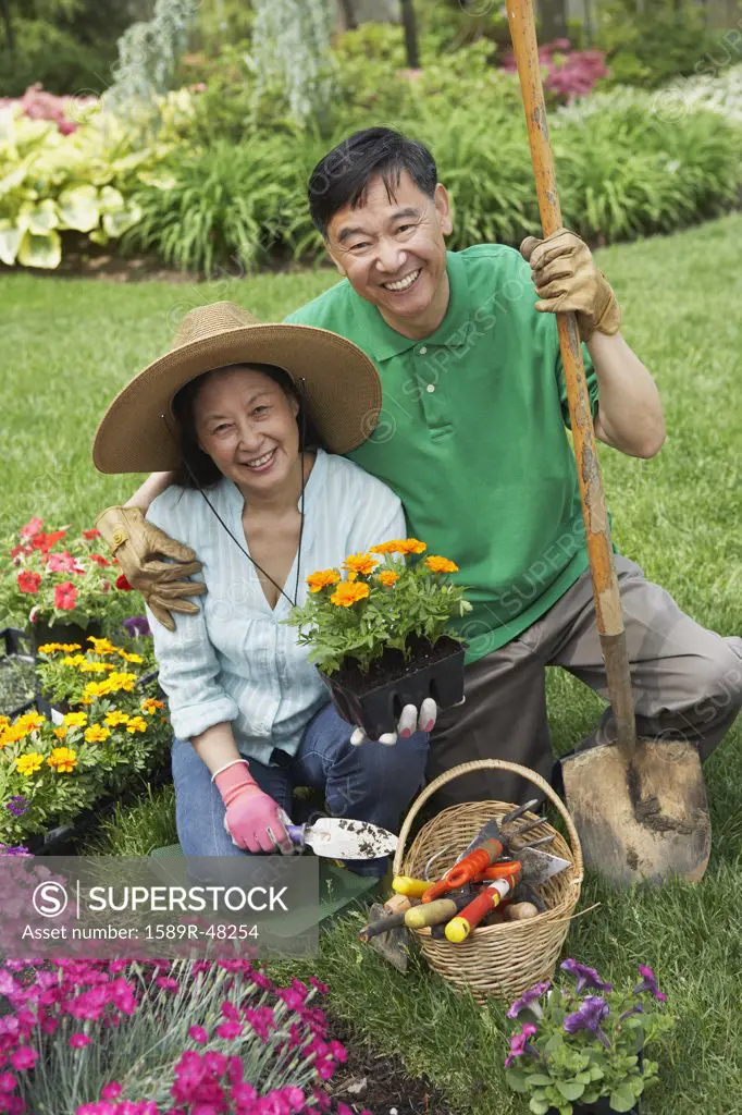 Senior Asian couple gardening