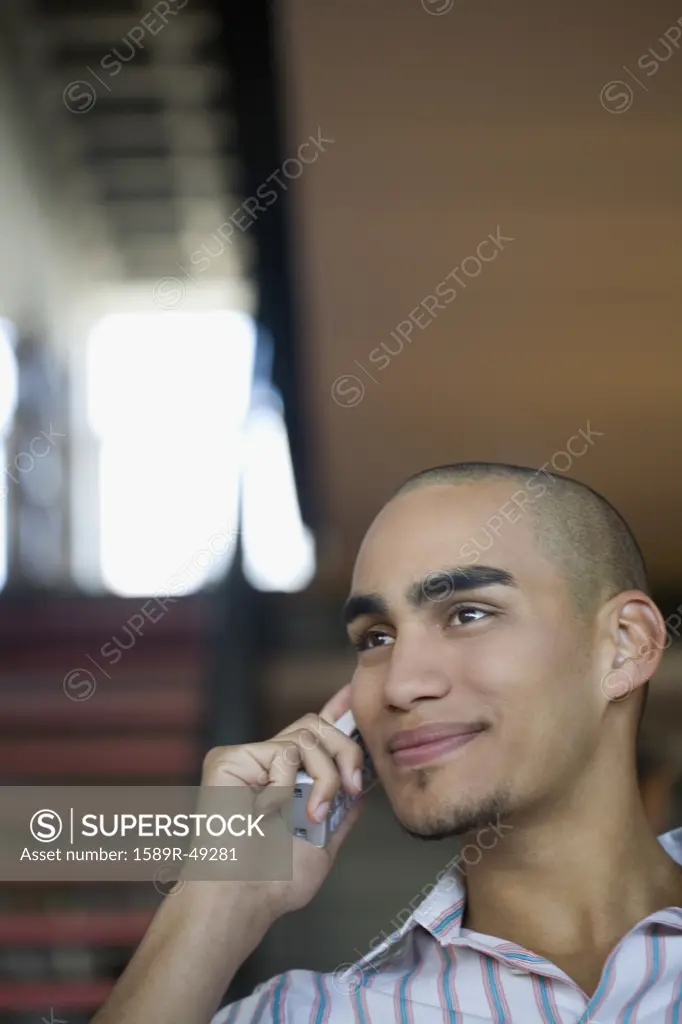 African American man talking on telephone