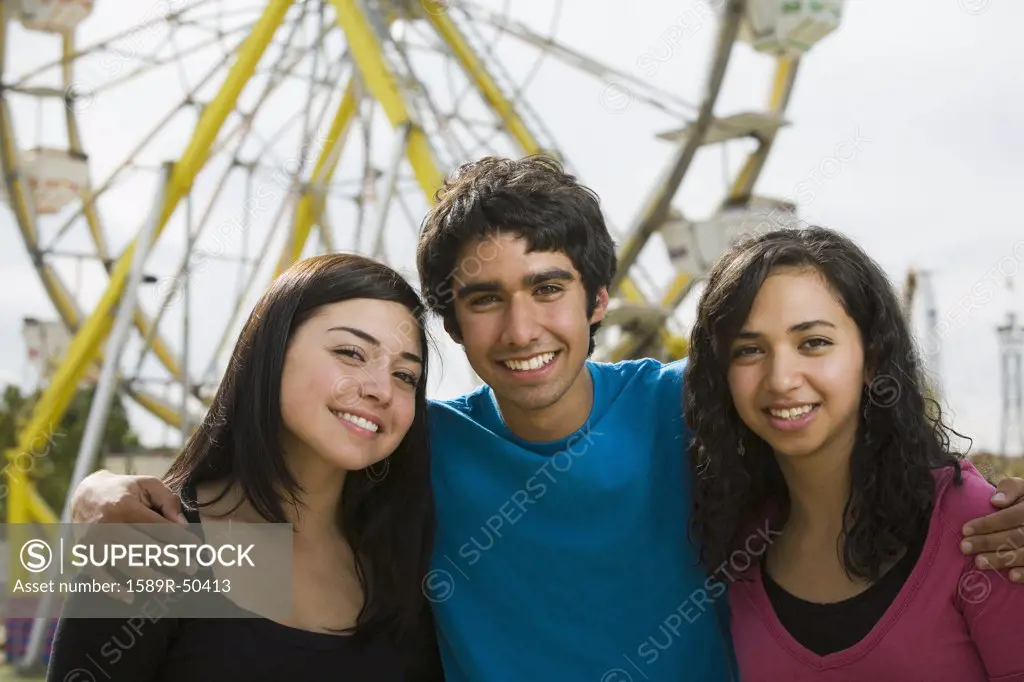 Multi-ethnic teenaged friends at carnival
