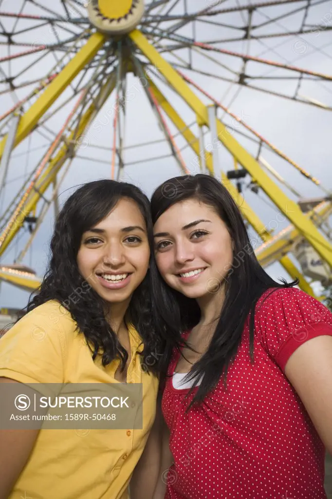 Multi-ethnic teenaged girls at carnival