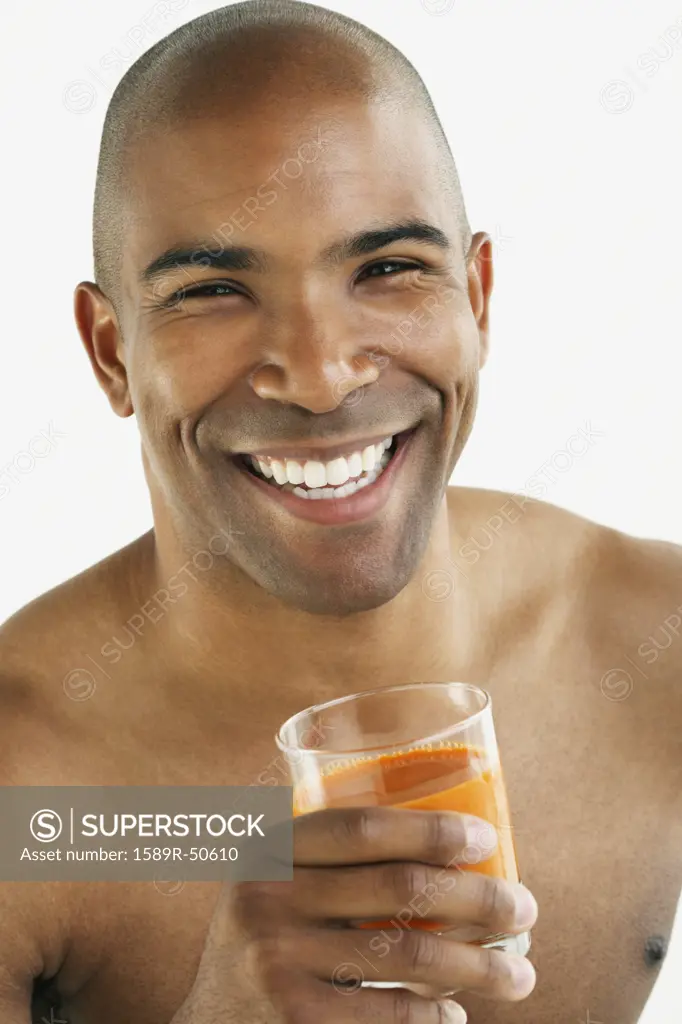 African American man drinking juice