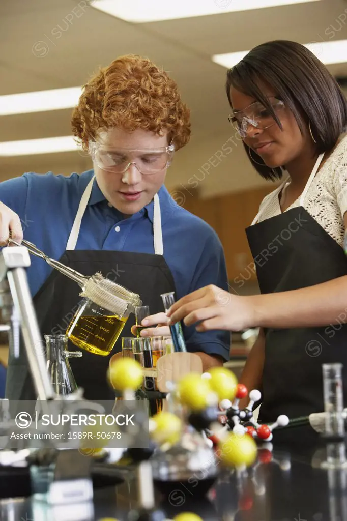 Multi-ethnic teenagers in science class