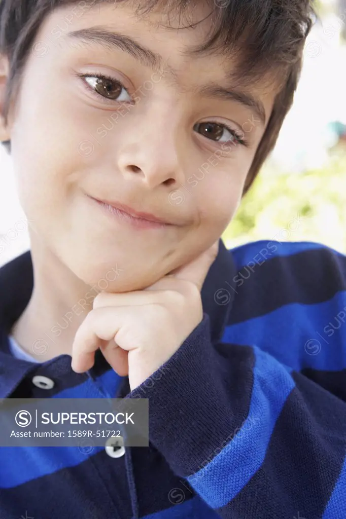 Hispanic boy making a face