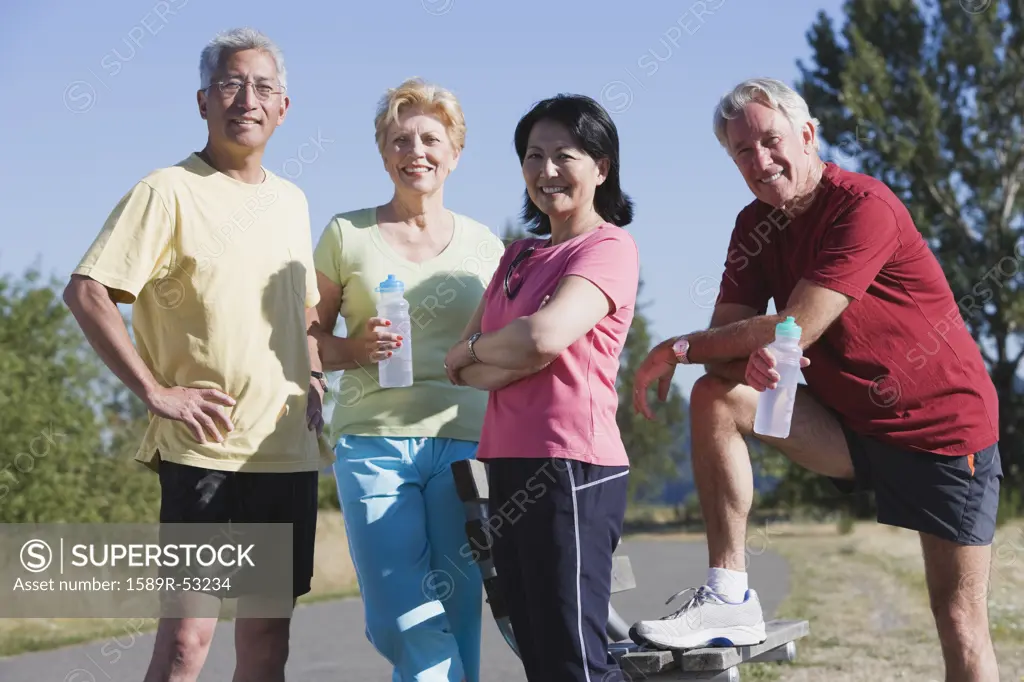 Multi-ethnic couples in athletic gear
