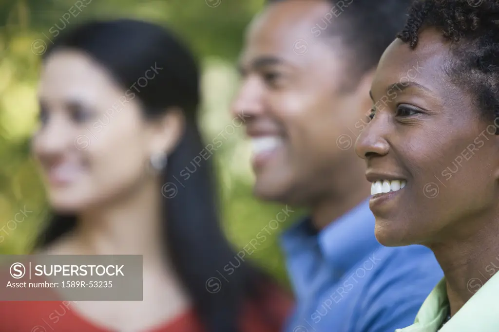 African woman with friends in background