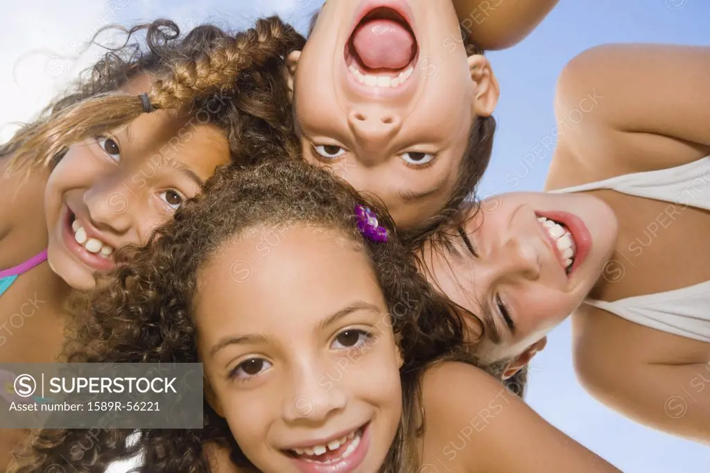 Multi-ethnic girls making faces