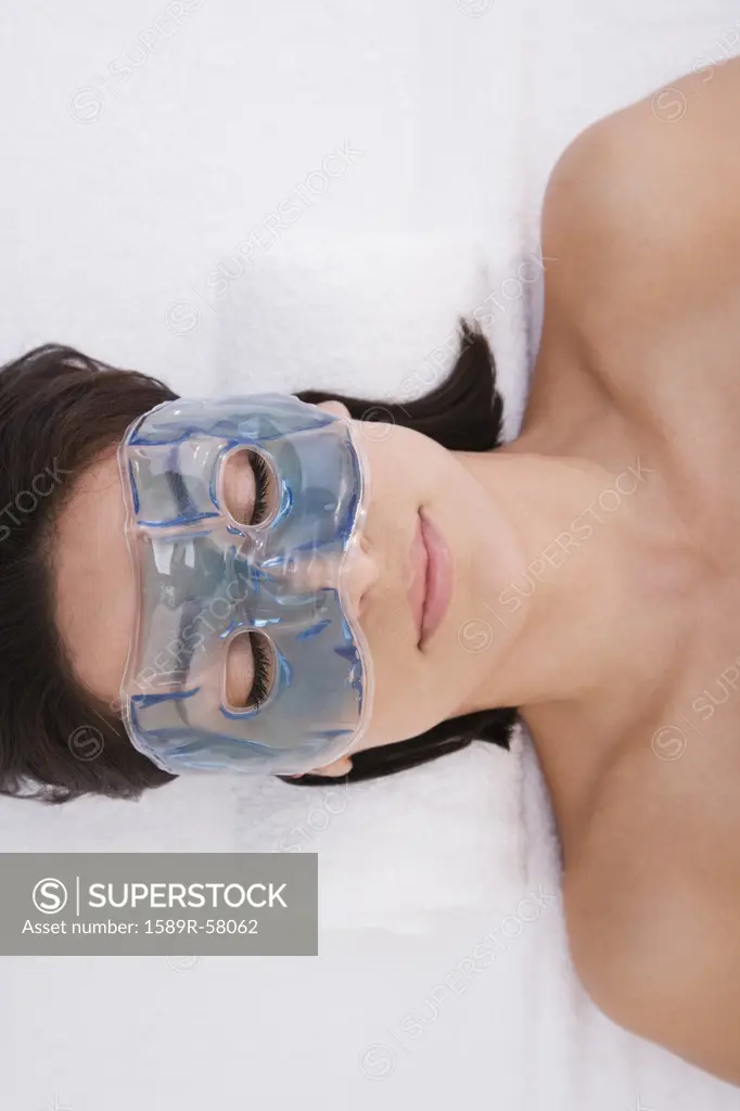 Hispanic woman wearing gel face mask