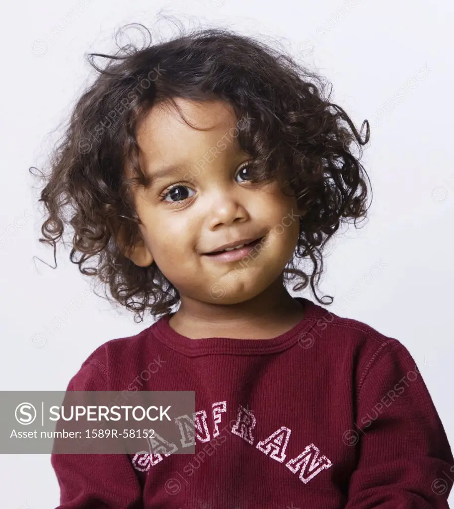 Mixed Race boy with curly hair