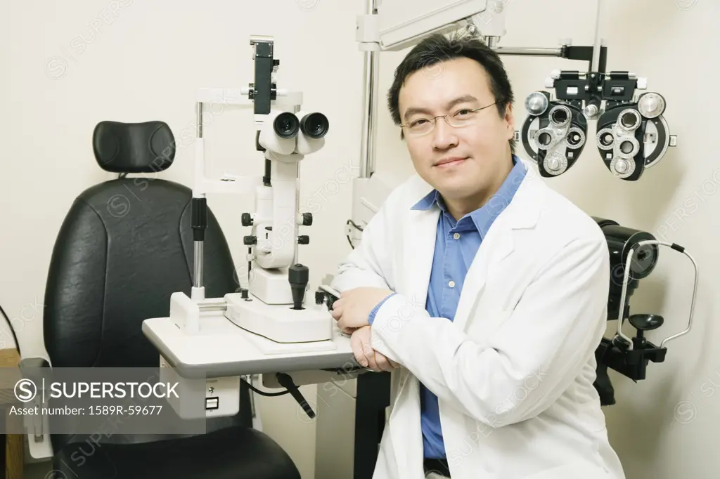 Asian male optometrist in office