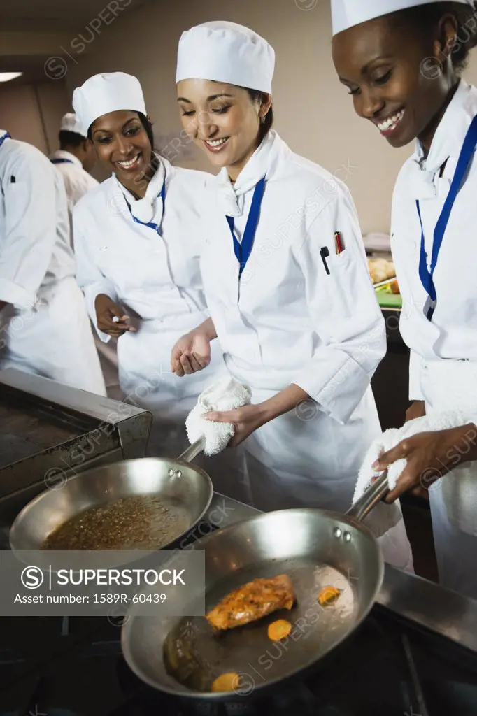 Multi-ethnic chefs preparing food
