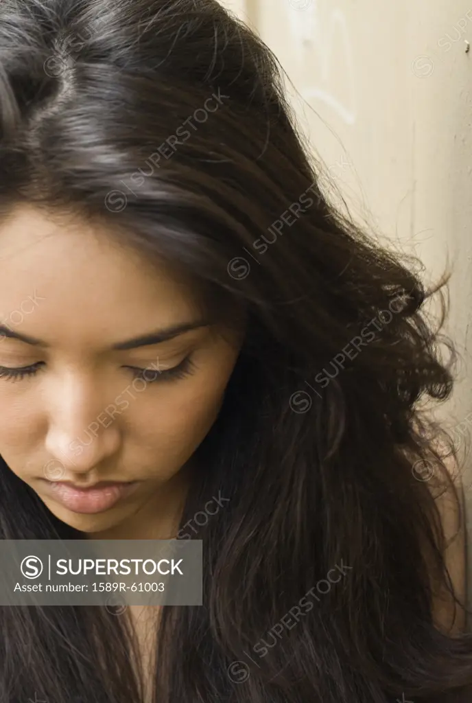 Middle Eastern woman with eyes closed