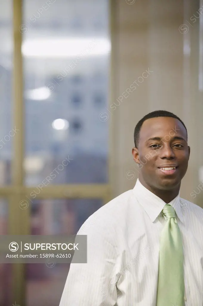 African businessman posing in office