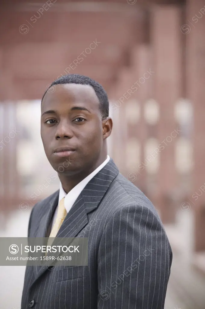 Close up of African businessman looking serious