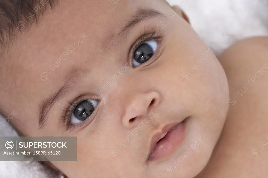 Close up of mixed race baby girl