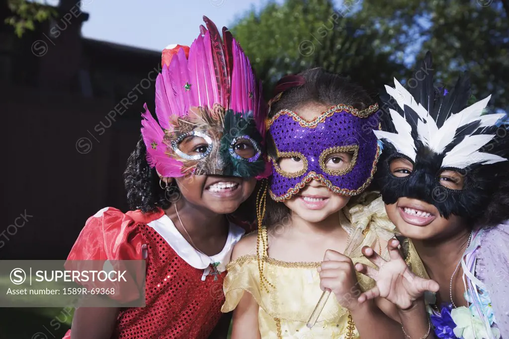 African girls wearing masks