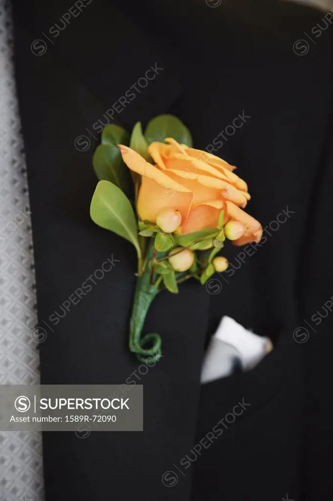 Close up of boutonniere on lapel