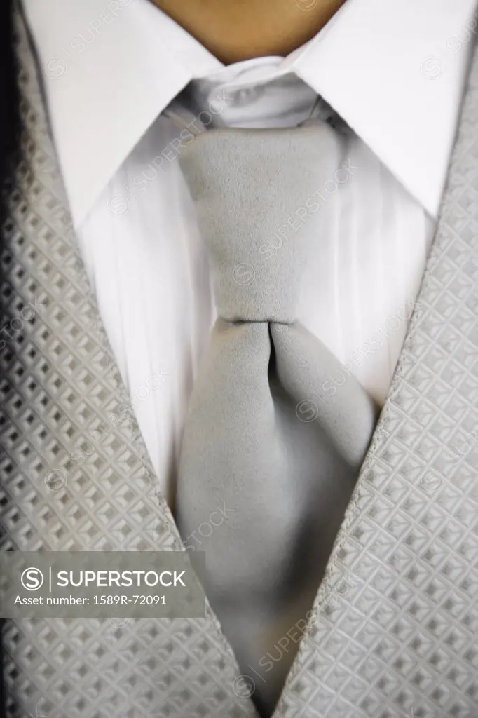 Close up of tuxedo tie and vest