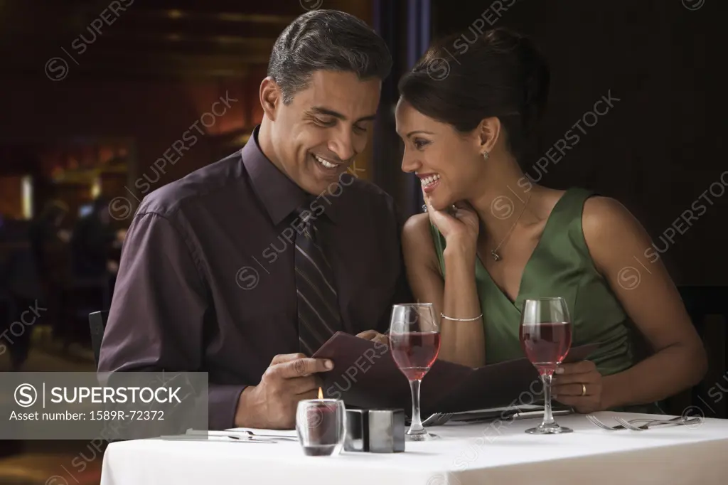 Hispanic couple at restaurant