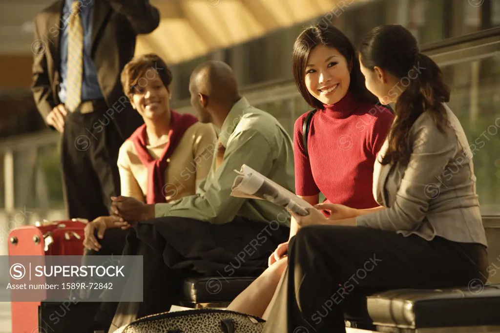 Multi-ethnic businesspeople talking