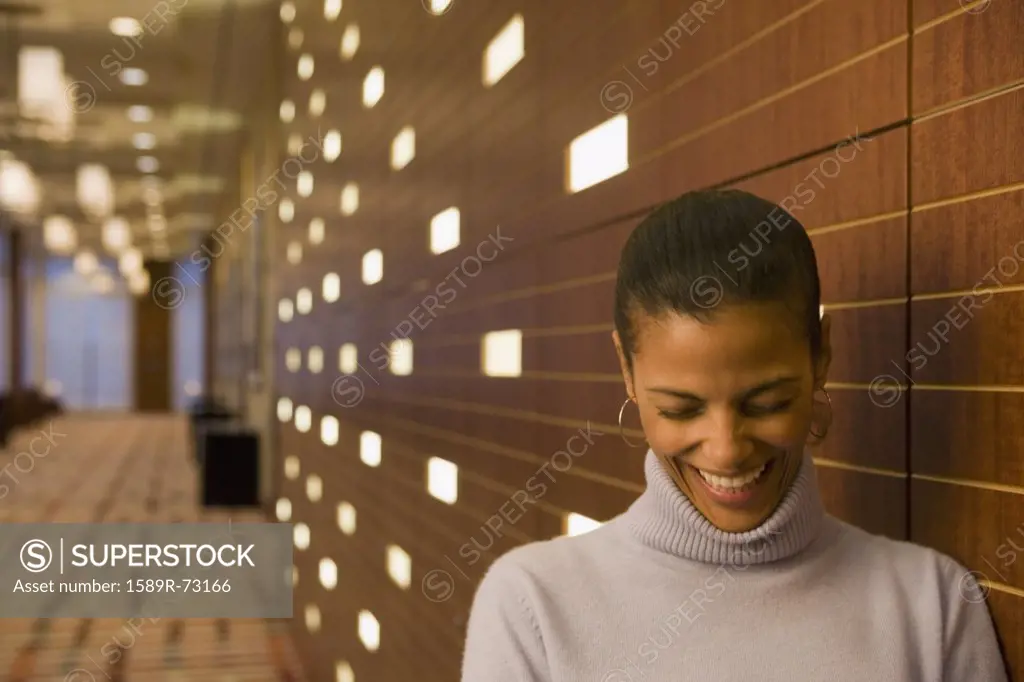 African businesswoman laughing