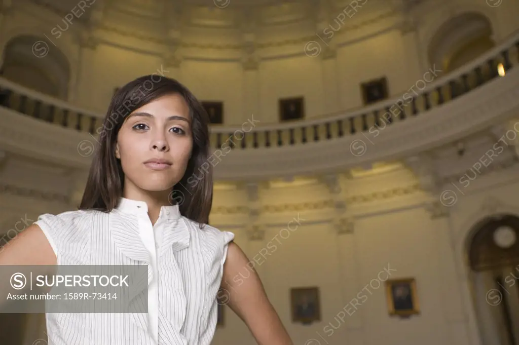 Hispanic businesswoman in capitol building