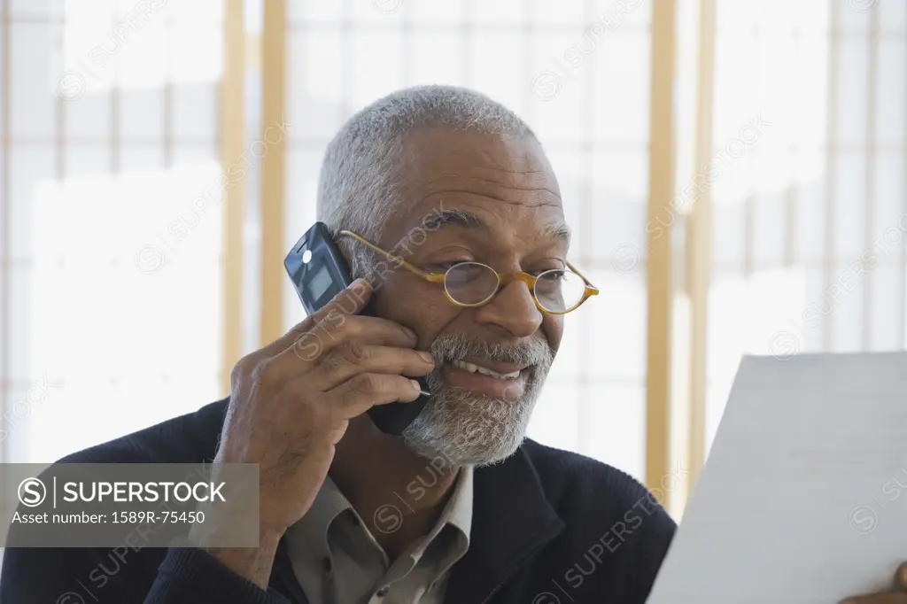 African man talking on cell phone