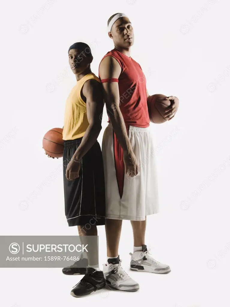 African basketball players standing back to back
