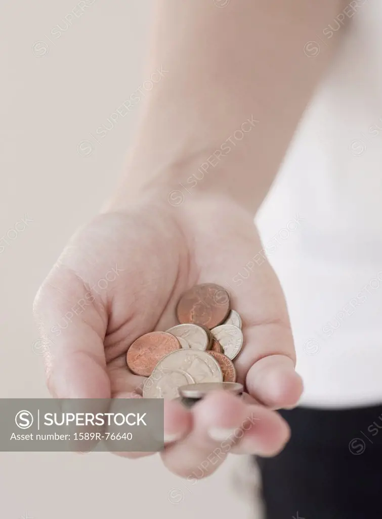 Woman holding coins