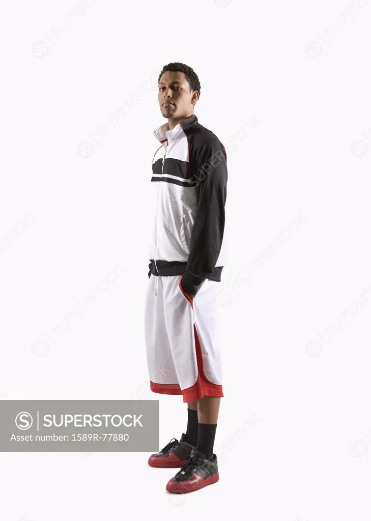 Mixed race basketball player looking serious