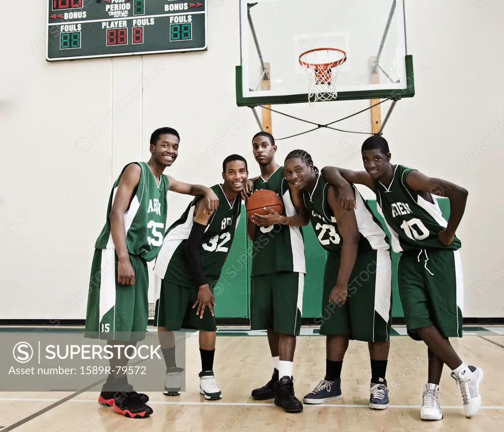 African basketball players in gym