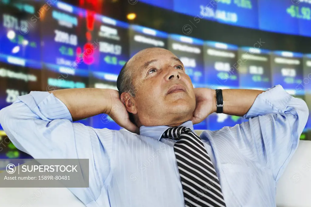 Hispanic businessman at stock exchange