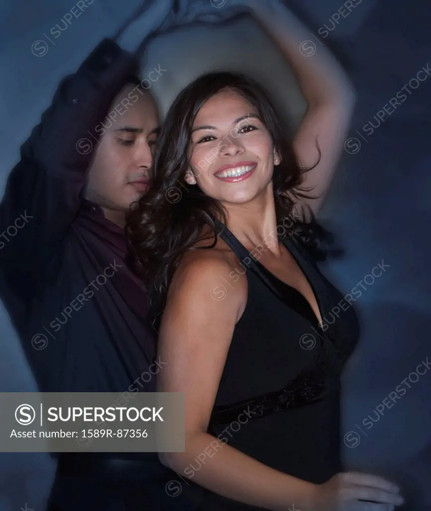 Couple dancing in nightclub
