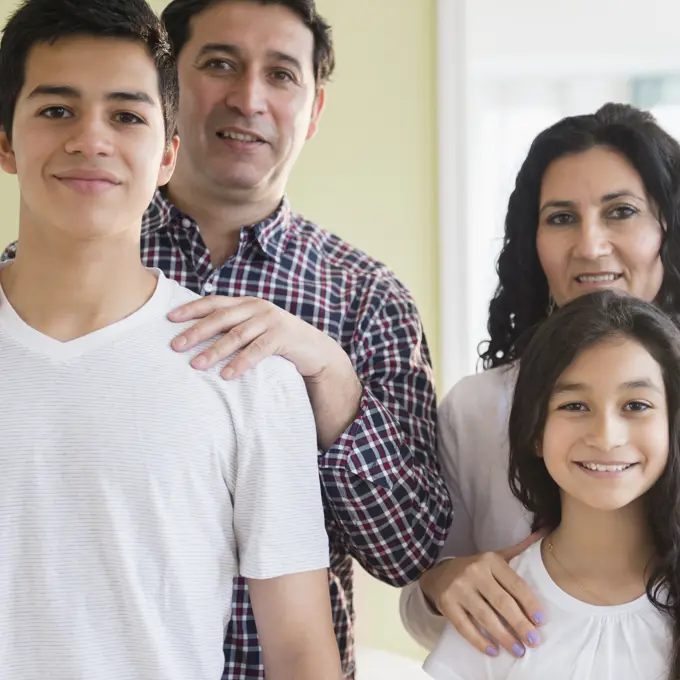 Hispanic family smiling