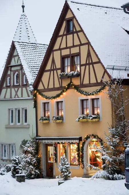 Quaint, snow covered village decorated for Christmas