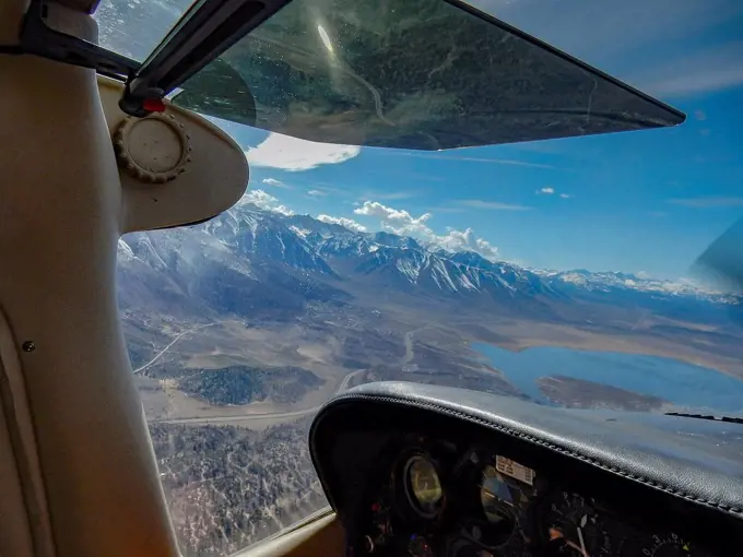 View of lake and mountains from cockpit, Bishop, California, United States,