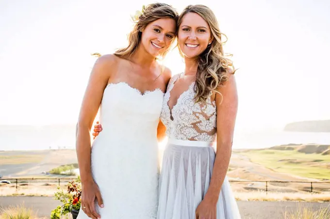 Portrait of smiling Caucasian brides
