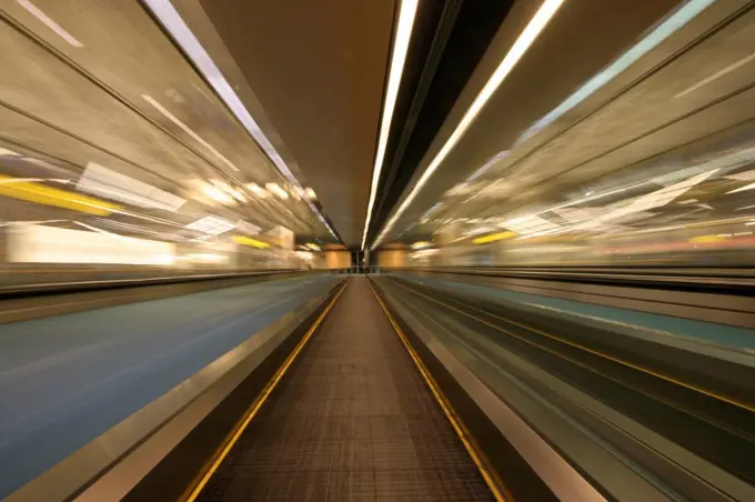 Blurred motion of moving walkway